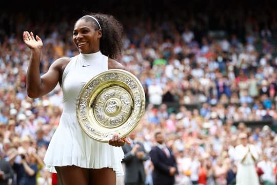 LONDON, ENGLAND - JULY 09: Serena Williams of The United States holds the trophy following victory in The Ladies Singles Final against Angelique Kerber of Germany on day twelve of the Wimbledon Lawn Tennis Championships at the All England Lawn Tennis and Croquet Club on July 9, 2016 in London, England. (Photo by Clive Brunskill/Getty Images)