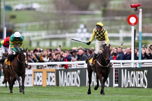 CHELTENHAM, ENGLAND - MARCH 15: Jockey Paul Townend celebrates with horse Al Boum Photo following their victory in The Magners Cheltenham Gold Cup Steeple Chase ahead of Barry Geraghty and horse Anibale Fly during the Gold Cup Day at Cheltenham Festival at Cheltenham Racecourse on March 15, 2019 in Cheltenham, England. (Photo by Michael Steele/Getty Images)